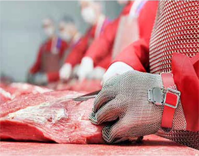 butcher cutting meat